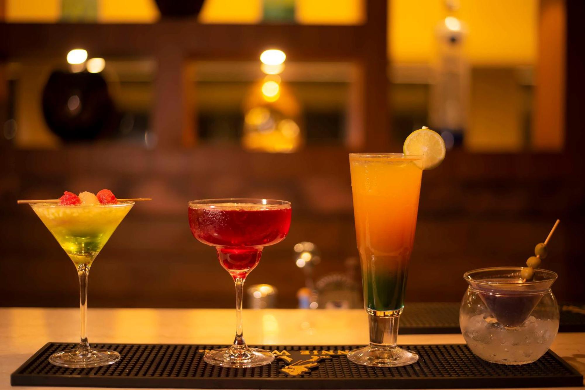 Radisson Blu Hotel Guwahati Dış mekan fotoğraf A selection of cocktails